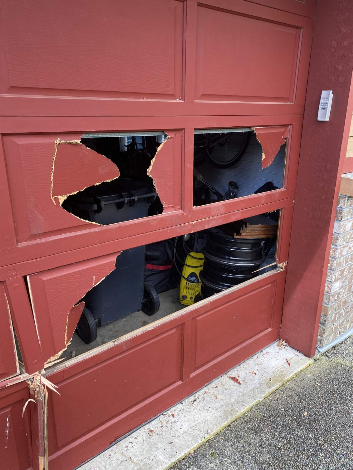 The hungry bear tore through the garage door of a Port Moody home to get to the garbage inside.