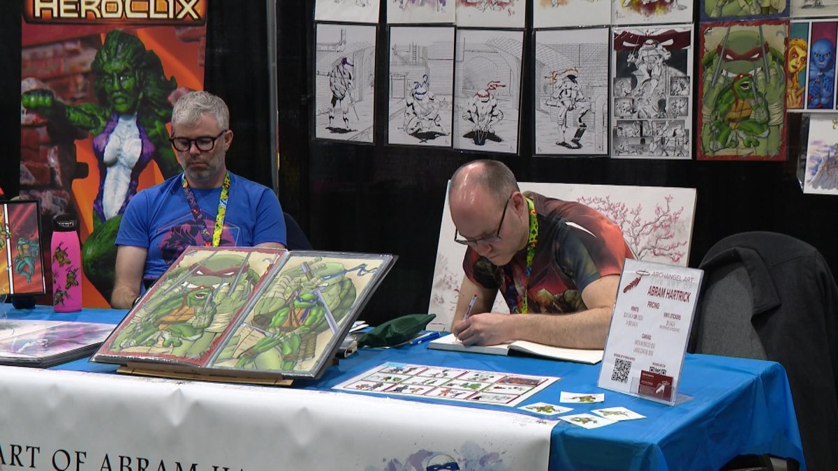 Abram Hartrick (right) has been attending expos for the last seven years, bringing along his '80s-style art. Vendors are at Prairieland Park in Saskatoon this Saturday and Sunday for Entertainment Expo.