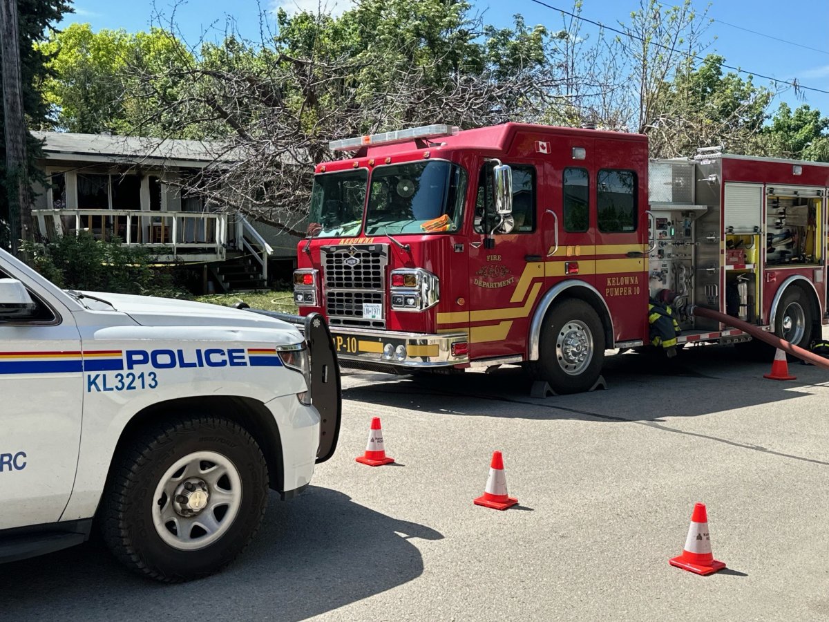 Police and fire crews remained on the scene of a house fire in Kelowna's Rutland neighbourhood Sunday afternoon. Significant damage is visible from the street.