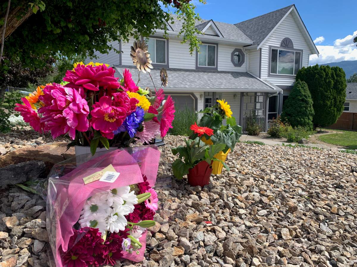File photo of flowers placed outside the home along the 5500 block of Heritage Drive in Vernon, B.C.