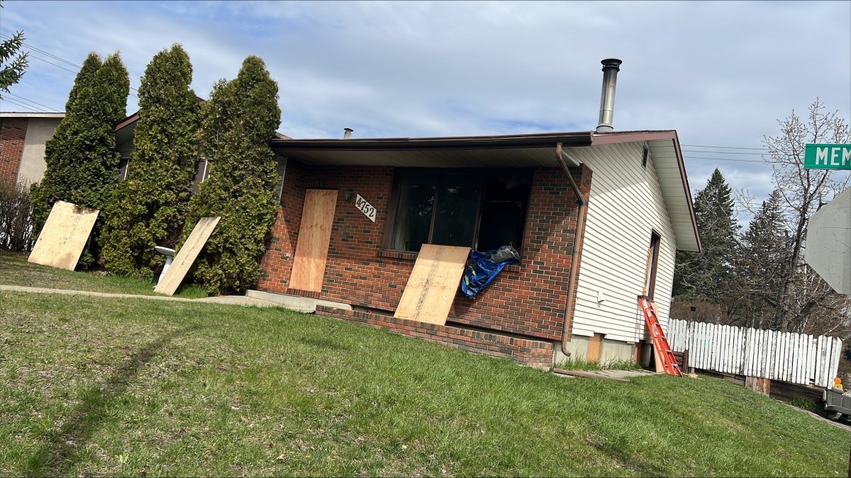 Eight people and several pets were safely evacuated from a large house fire in Calgary's Marlborough community Saturday night. The flames also damaged nearby power lines.