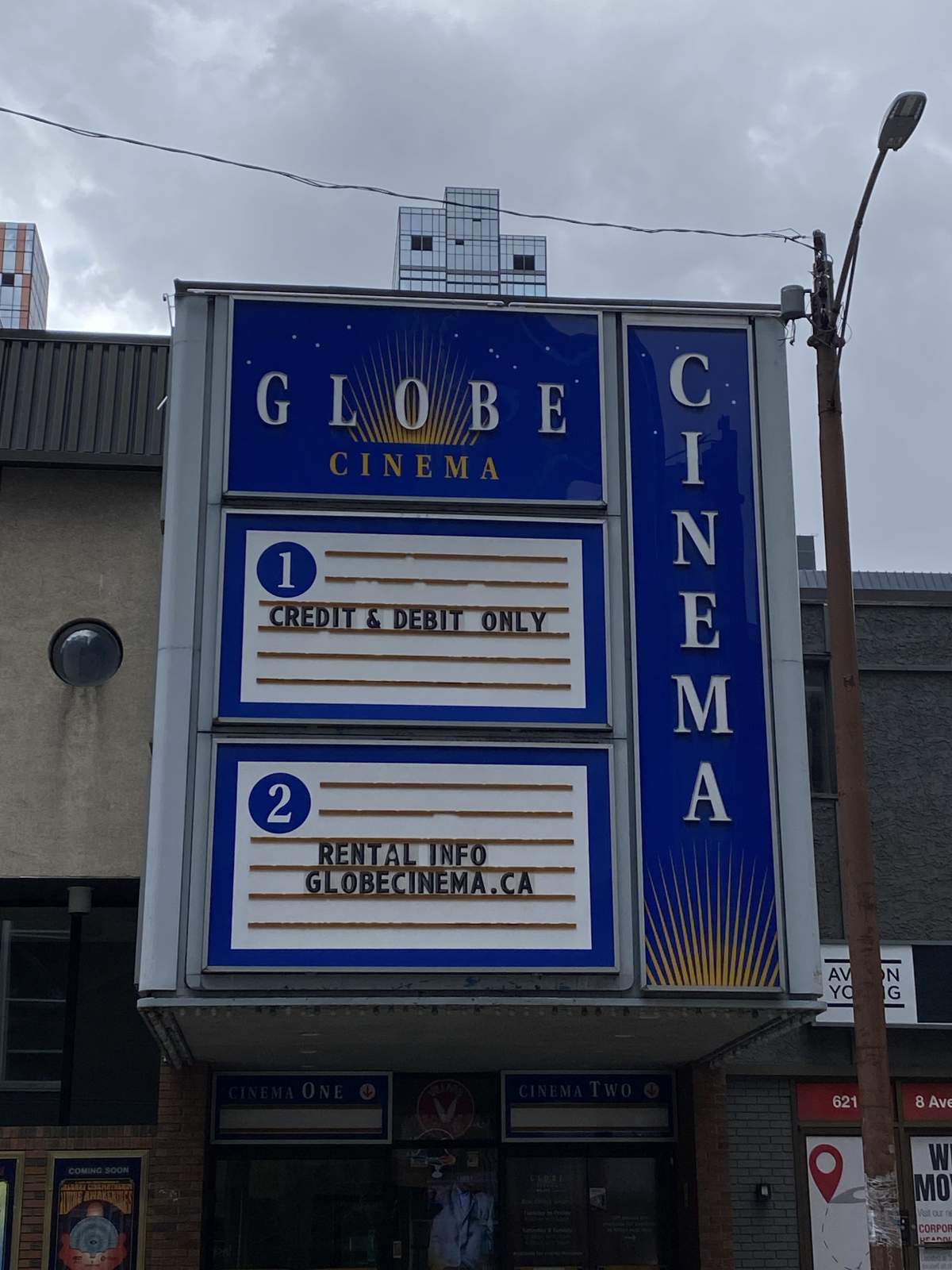 The Globe Cinema is listed for sale for $2.4M.