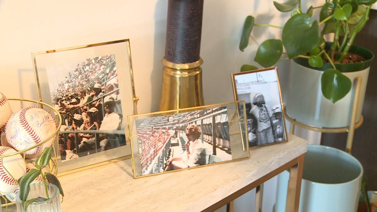 Portraits of a family at a Blue Jays game