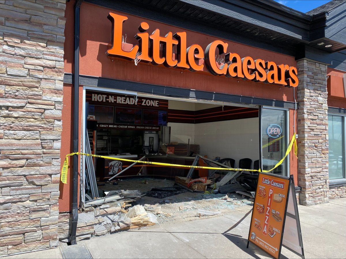 No injuries were reported when a vehicle crashed into Little Caesars Pizza at 18 Panatella Blvd. Northwest in Calgary Thursday, May 16, 2024.