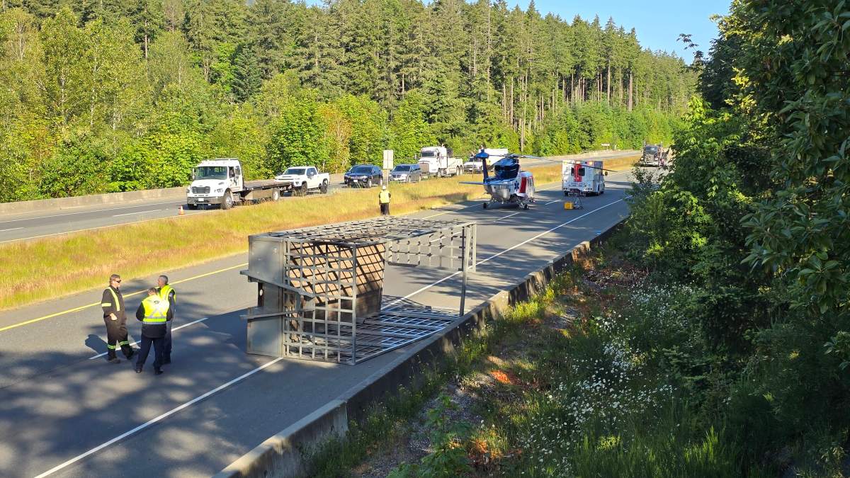 The aftermath of a truck and SUV collision on Highway 19 in Nanaimo on Wednesday, June 19.