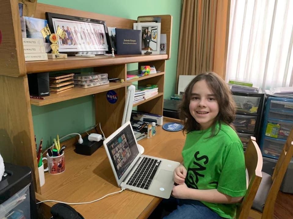 Honciuc Menendez, pictured at 12 years-old, attending his first day of university virtually from Ecuador.