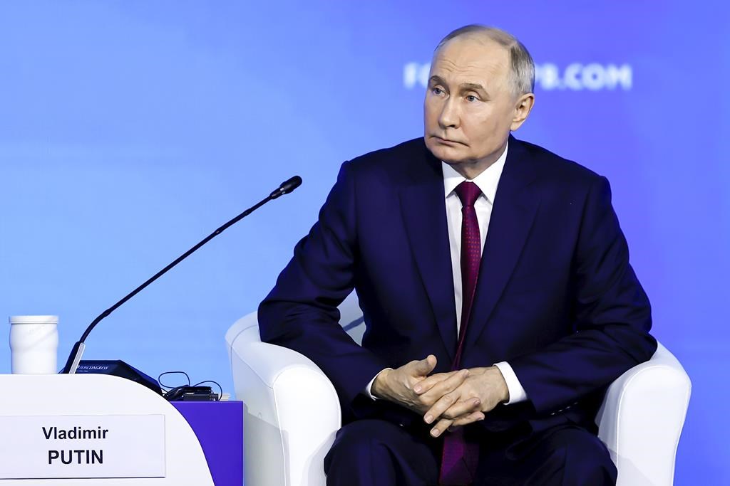 Putin says no current threat would warrant use of nuclear arms