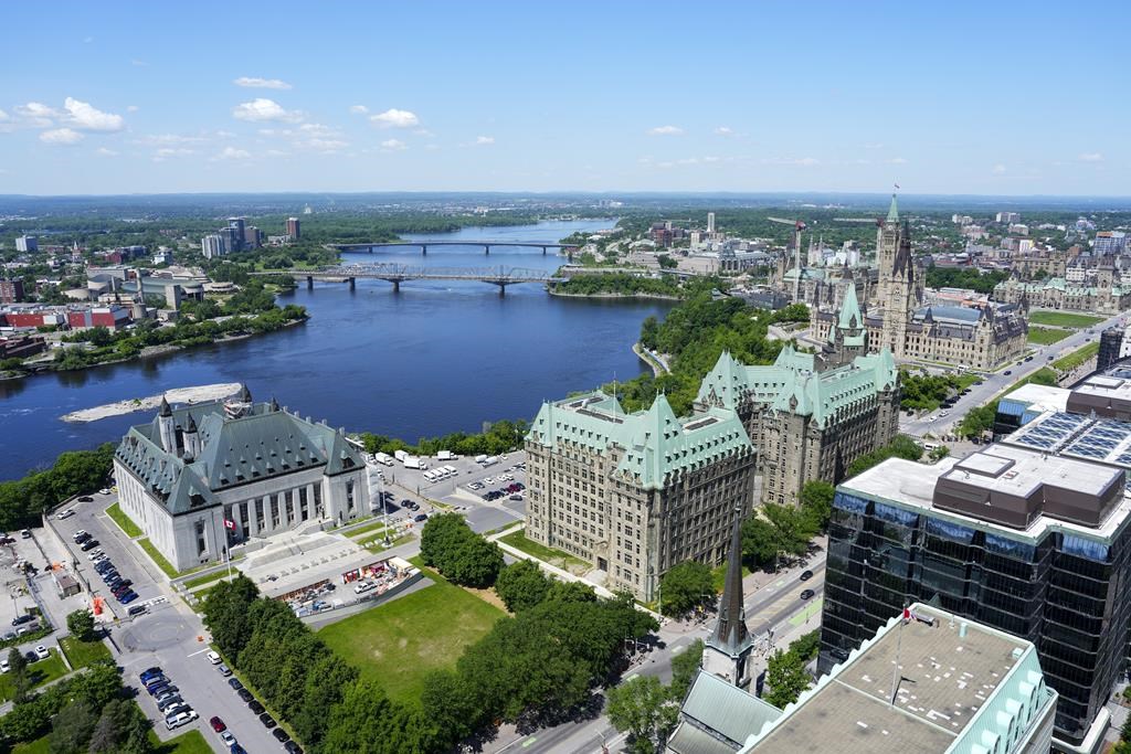 The City of Ottawa is hiring a new commissioner to grow its nightlife economy and help change its image as the "town that fun forgot." The Supreme Court of Canada and Justice and Confederation Building of Parliament Hill are pictured in Ottawa on Monday, June 3, 2024. 