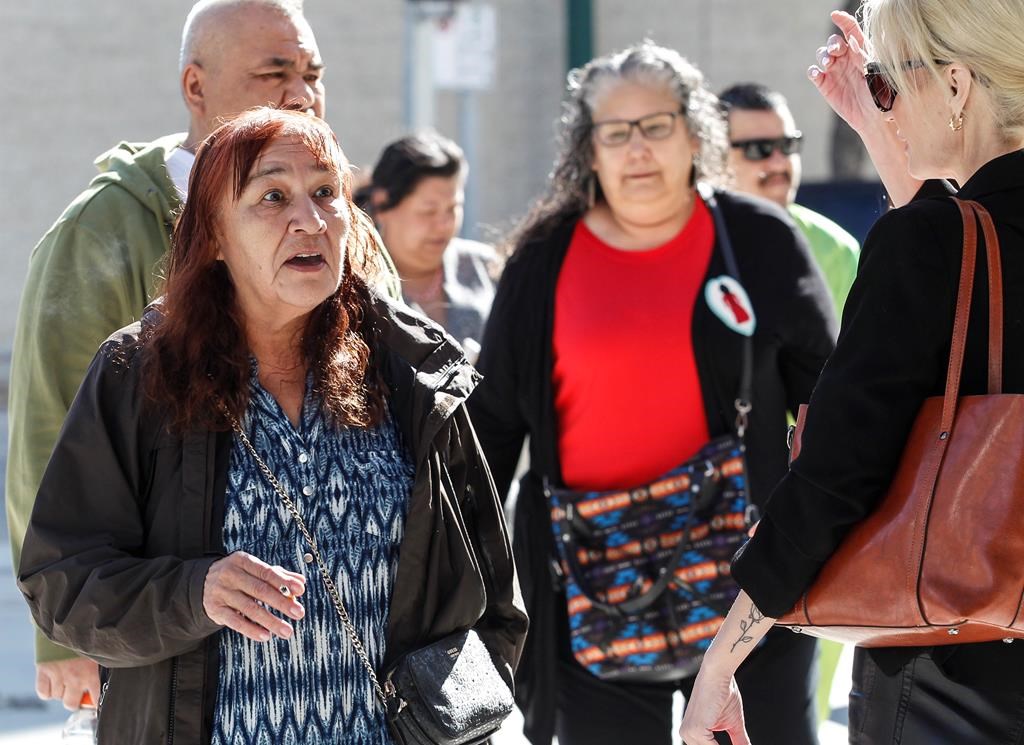 Donna Bartlett, grandmother of Marcedes Myran, and other families and supporters of murdered women enter the Manitoba Law Courts for the trial of Jeremy Skibicki in Winnipeg on Tuesday, May 8, 2024. 