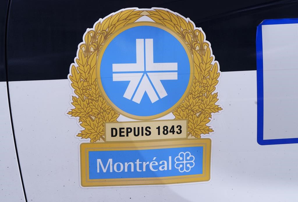 The Montreal Police logo is seen on a police car in Montreal on July 8, 2020.