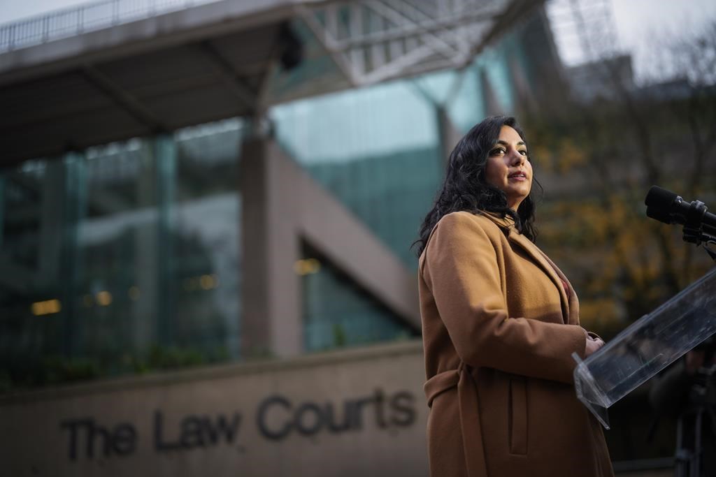 The British Columbia government says it has filed a class-action lawsuit against manufacturers of so-called "forever chemicals" involved in what it calls widespread contamination of drinking-water systems. B.C. Attorney General Niki Sharma pauses while responding to questions outside B.C. Supreme Court in Vancouver, Monday, Nov. 27, 2023. THE CANADIAN PRESS/Darryl Dyck.