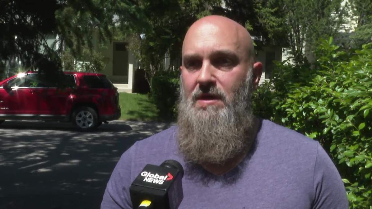 Neighbour Daryl Colpitts broke into a home to rescue a cat from a fire.