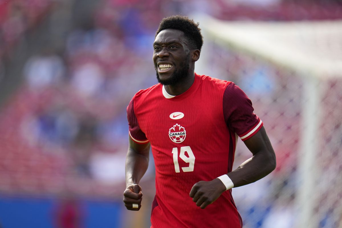 Canada forward Alphonso Davies (19) jogs up field after taking a shot in the second half of a CONCACAF Nations League Play-In soccer match against Trinidad And Tobago, Saturday, March 23, 2024, in Frisco, Texas.