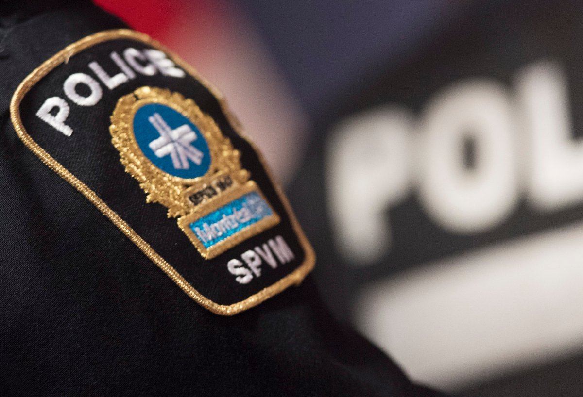 A Montreal Police badge is shown during a news conference in Montreal.