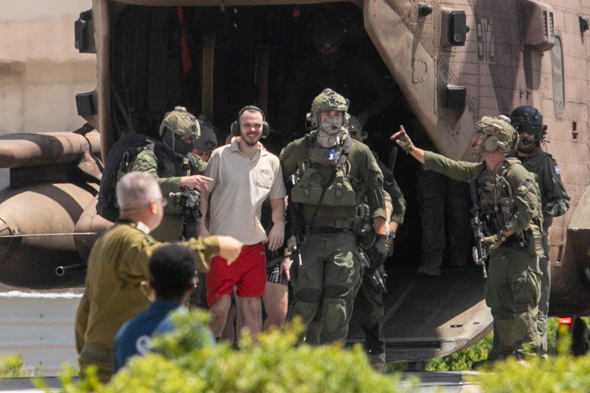 Andrey Kozlov, 27, one of four hostages who were kidnapped in a Hamas-led attack on Oct. 7, 2023 and was just rescued, arrives by helicopter to the Sheba Medical Center in Ramat Gan, Israel, Saturday, June 8, 2024.