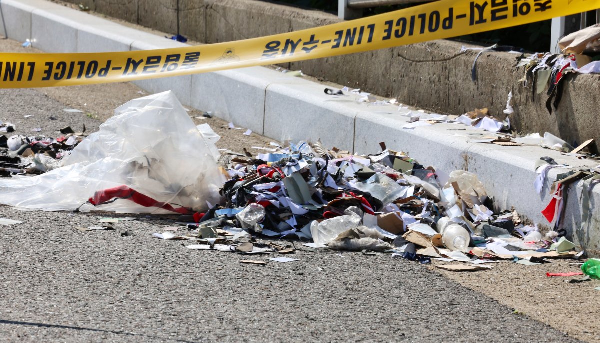 Trash from a balloon sent by North Korea is seen behind police tape in Incheon, South Korea, Sunday, June 2, 2024. South Korea has recently retaliated for North Korea's trash-carrying balloon launches with propaganda loudspeaker broadcasts at border areas.
