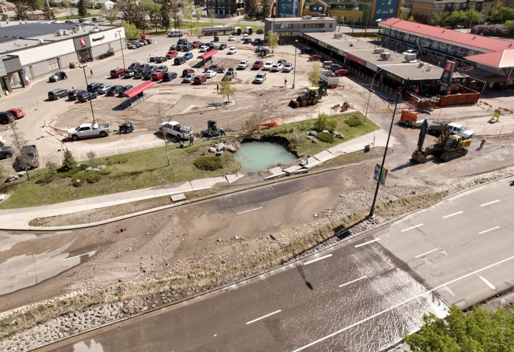 A view of the aftermath of a water main break in northwest Calgary's Montgomery neighbourhood on June 6, 2024.The water main break happened the night before.