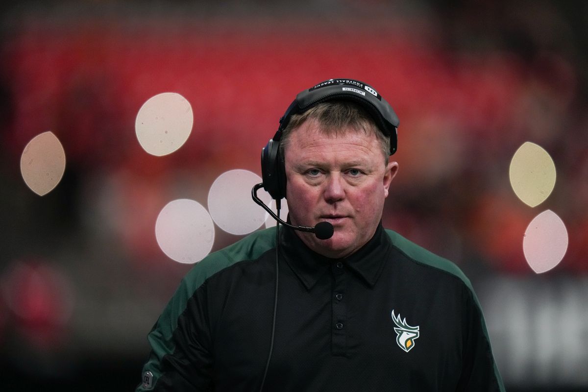 Edmonton Elks head coach Chris Jones walks on the sideline during a stoppage in play during the second half of a preseason CFL football game against the B.C. Lions, in Vancouver, on Friday, May 31, 2024.