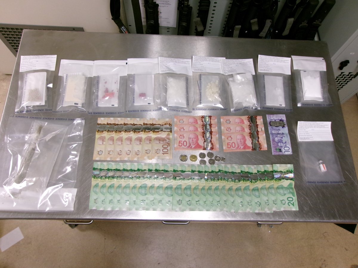 An RCMP photograph of the various drugs, and Canadian currency seized in Oliver, B.C.