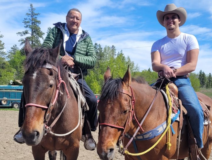 A photo of Duane Mark and Lloyd Templeton sitting on horses.