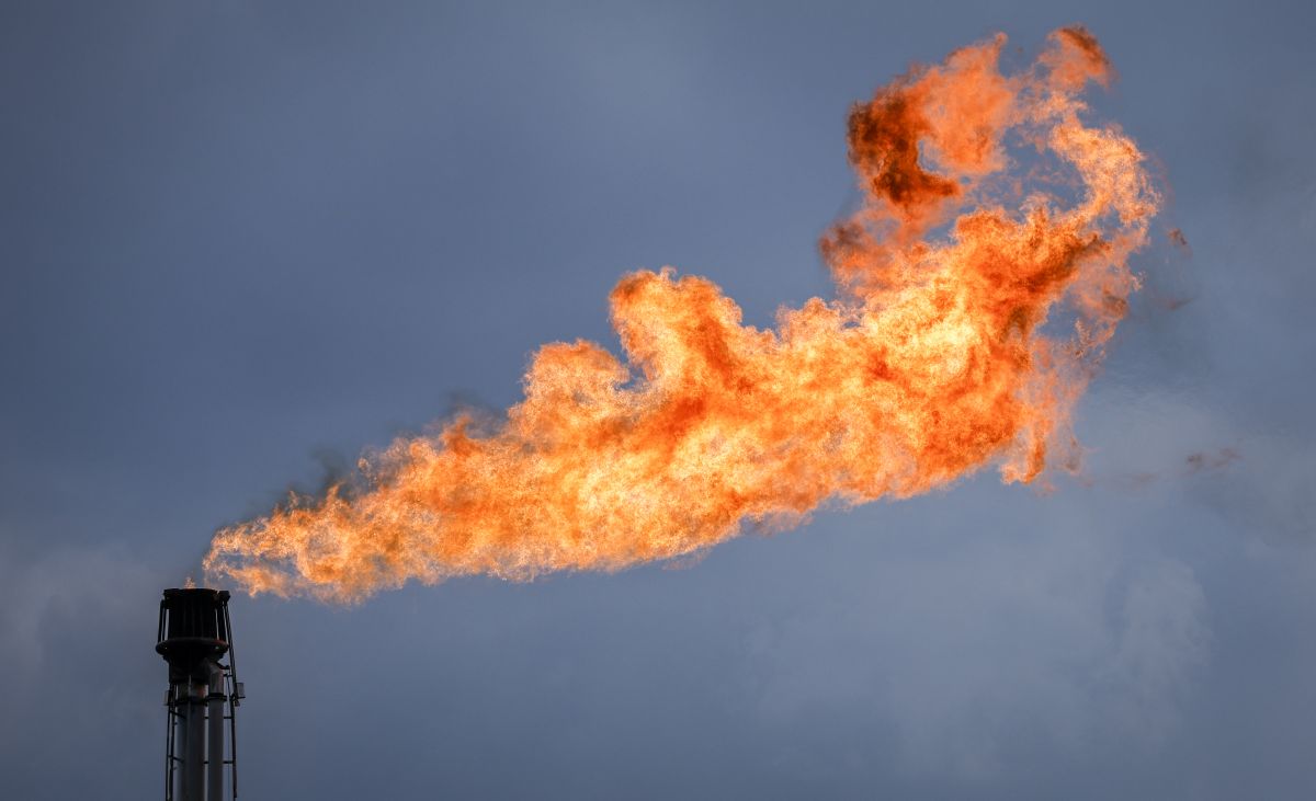 A flare stack burns off excess gas at a processing facility near Crossfield, Alta., Tuesday, June 13, 2023.