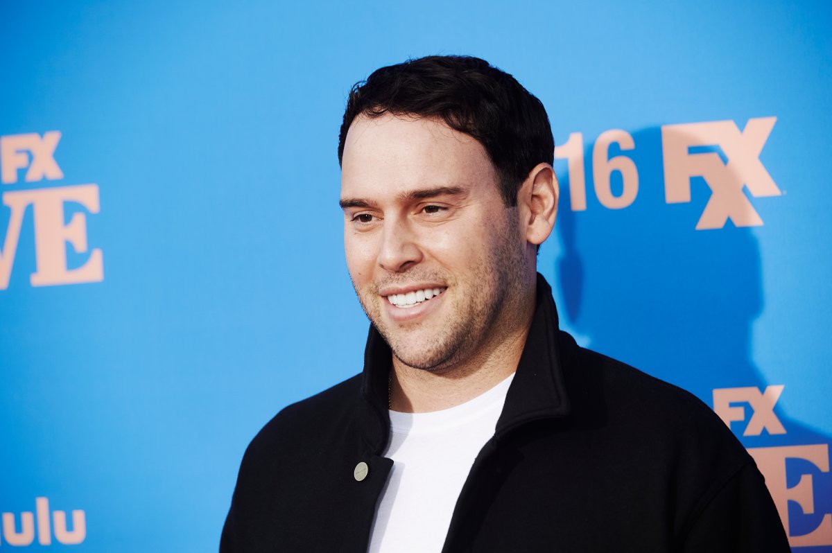 Scooter Braun smiling on a red carpet