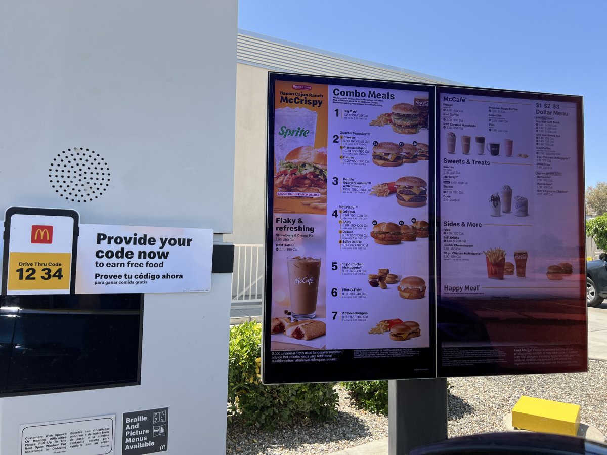 A McDonald's menu board at the drive-thru.