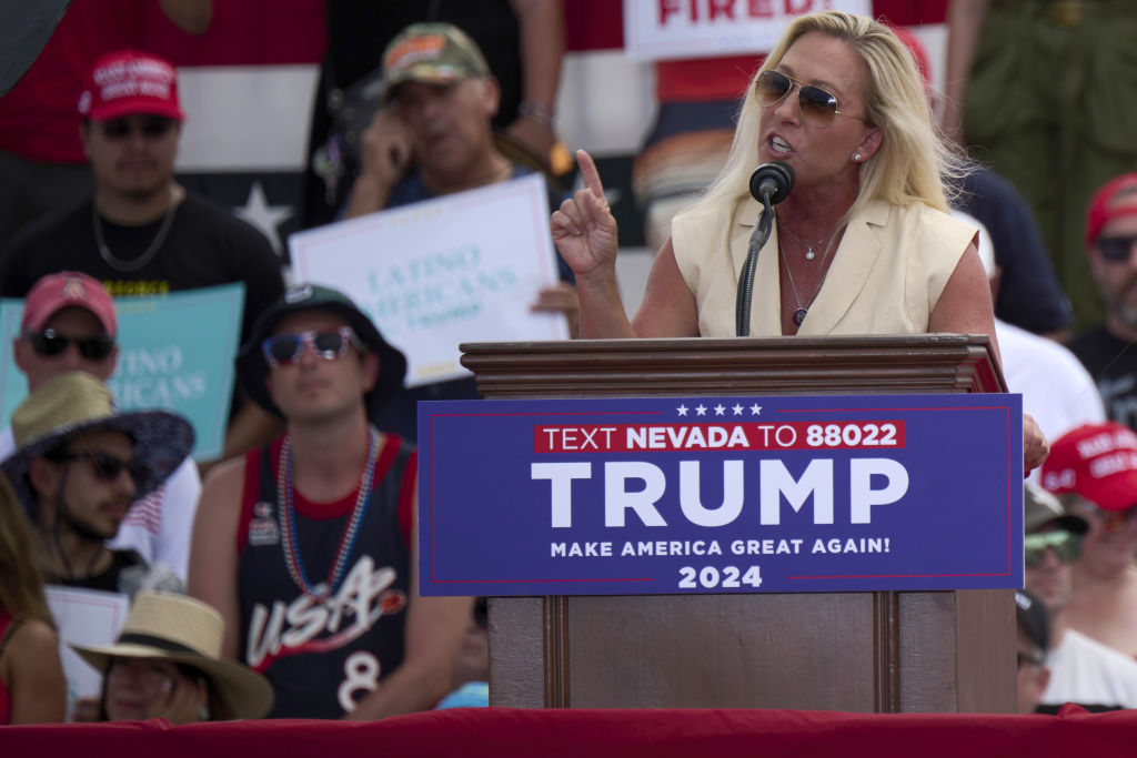 Representative Marjorie Taylor Greene, a Republican from Georgia, speaks during a campaign event with former US President Donald Trump, not pictured, at Sunset Park in Las Vegas, Nevada, US, on Sunday, June 9, 2024. Trump said he'd scrap taxes on tipped earnings for hospitality workers if he wins the White House, calibrating his message for swing-state voters in Nevada as he fights back from his felony conviction.
