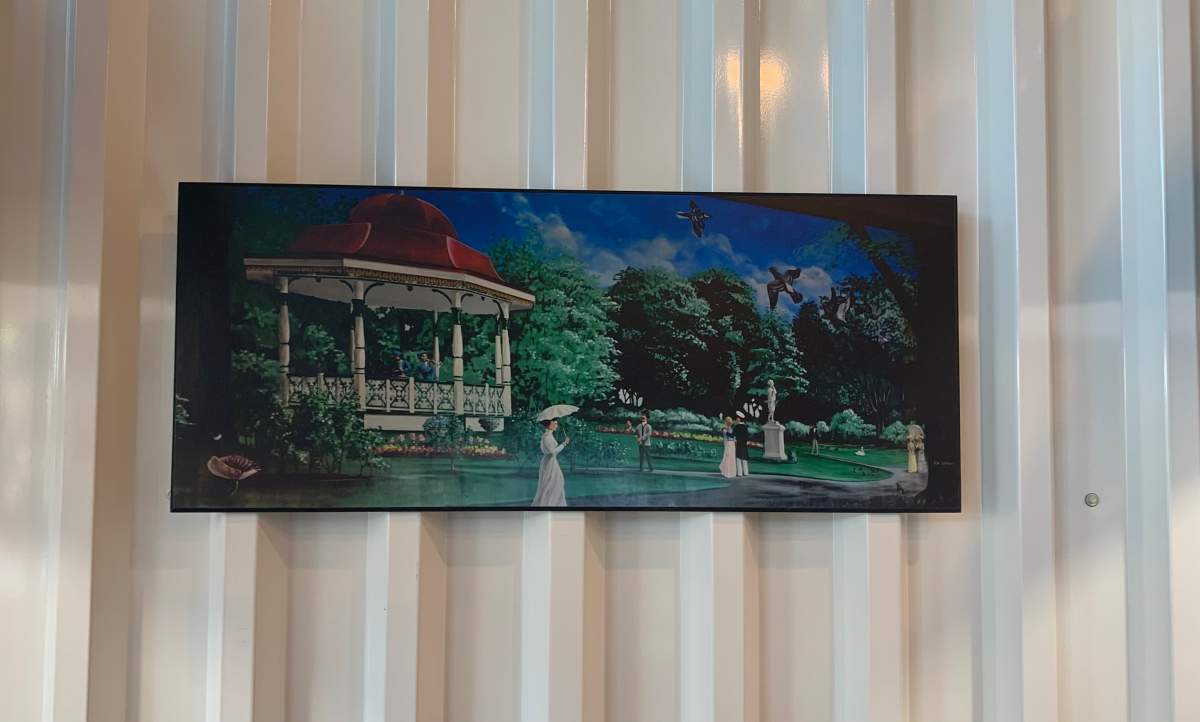 A photo of the Public Gardens mural hangs on the wall of the new McDonald’s location on Quinpool Road.
