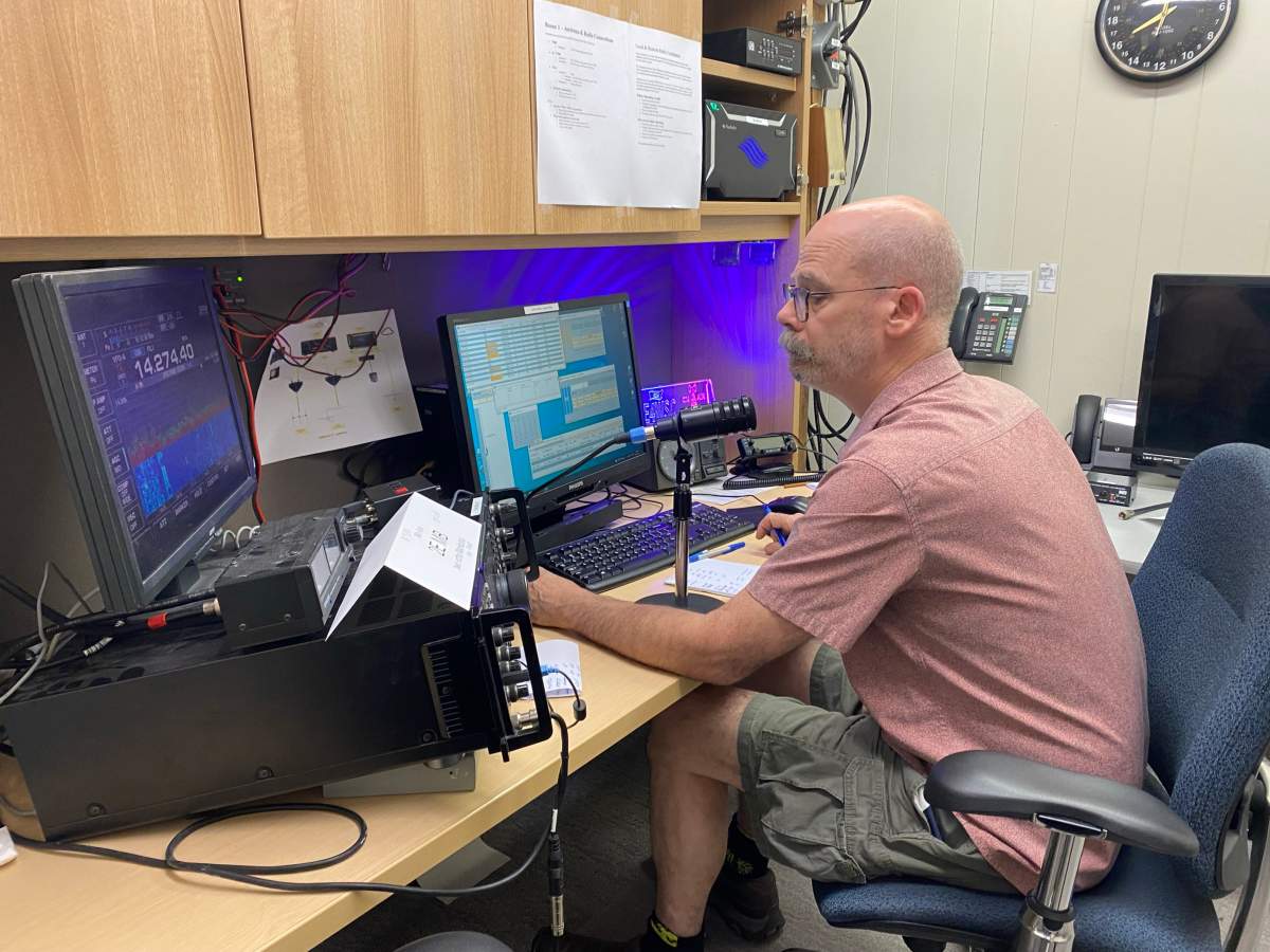 Jim Sutton, secretary/public information officer for Radio Amateurs of Manitoba, takes the controls during Field Day in Winnipeg.