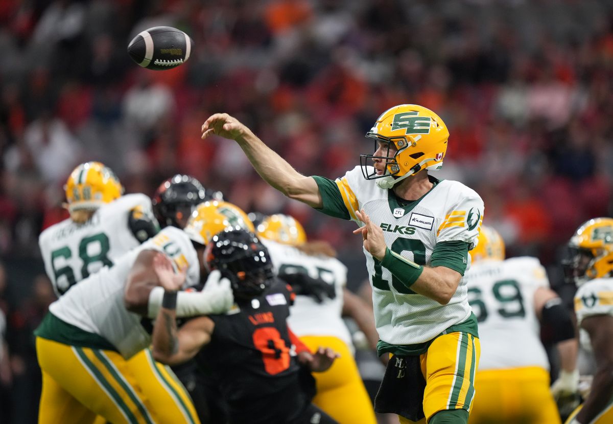 Edmonton Elks quarterback McLeod Bethel-Thompson passes during the first half of a CFL football game against the B.C. Lions, in Vancouver, on Thursday, June 27, 2024.
