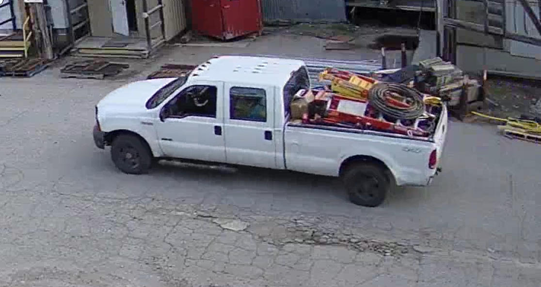 Surveillance footage of the vehicle, a white Ford F-350, suspected in the theft of tools and equipment at a business in the Southern Interior.