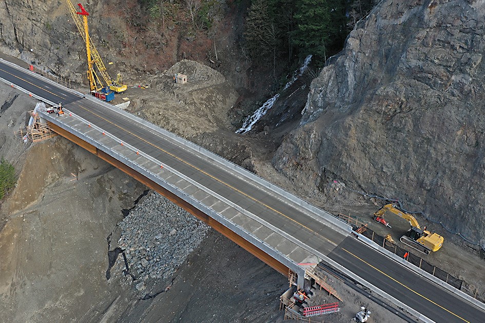 An aerial view of the new bridge that’s replacing a culvert that was washed out during catastrophic flooding in November 2021.