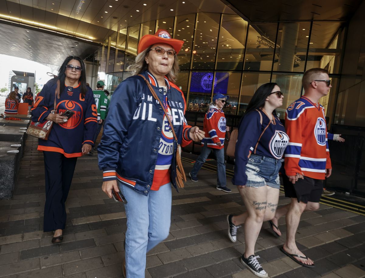 Edmonton Oilers fans arrive for Game 6 of the Western Conference finals of the NHL hockey Stanley Cup playoffs against the Dallas Stars in Edmonton, Sunday, June 2, 2024.