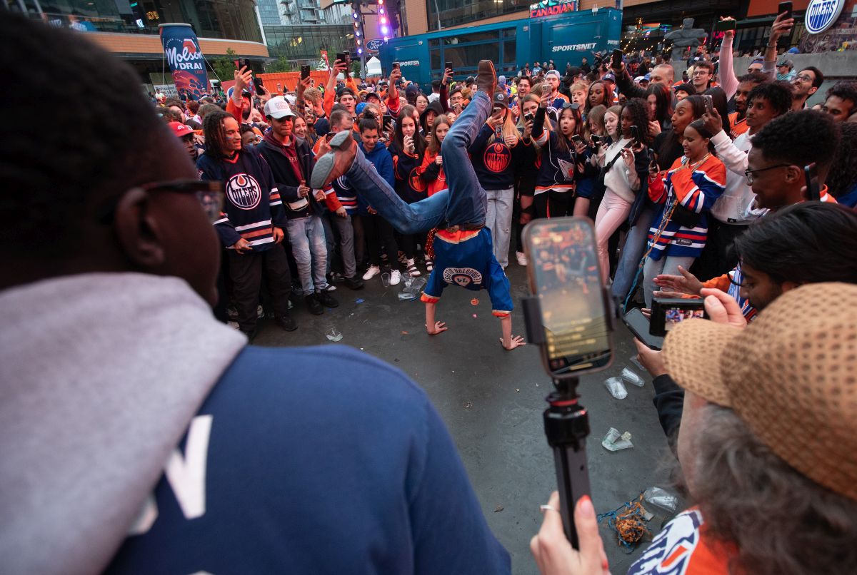 Oilers fans celebrate after the Edmonton Oilers defeated the Florida Panthers during a watch party for Game 5 of the NHL Stanley Cup final, in Edmonton on Tuesday, June 18, 2024.