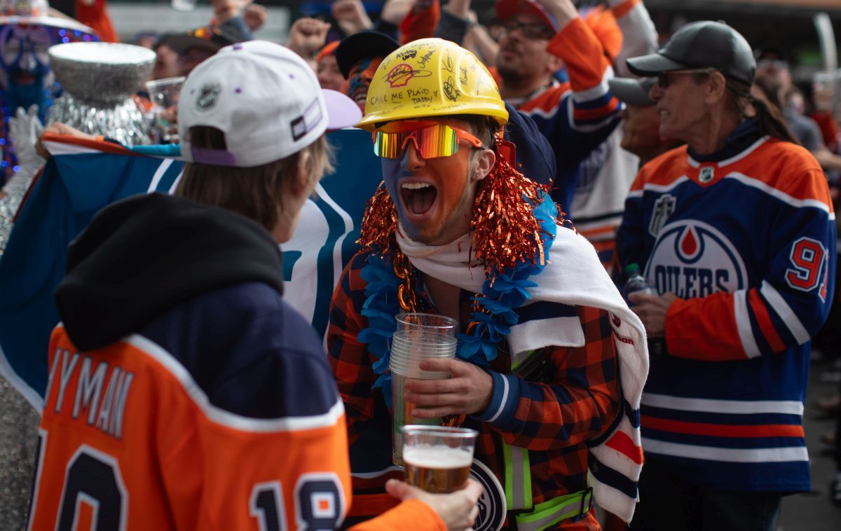 Oilers fans react to a goal as they watch the Edmonton Oilers take on the Florida Panthers during a watch party for Game 5 of the NHL Stanley Cup final, in Edmonton on Tuesday, June 18, 2024.
