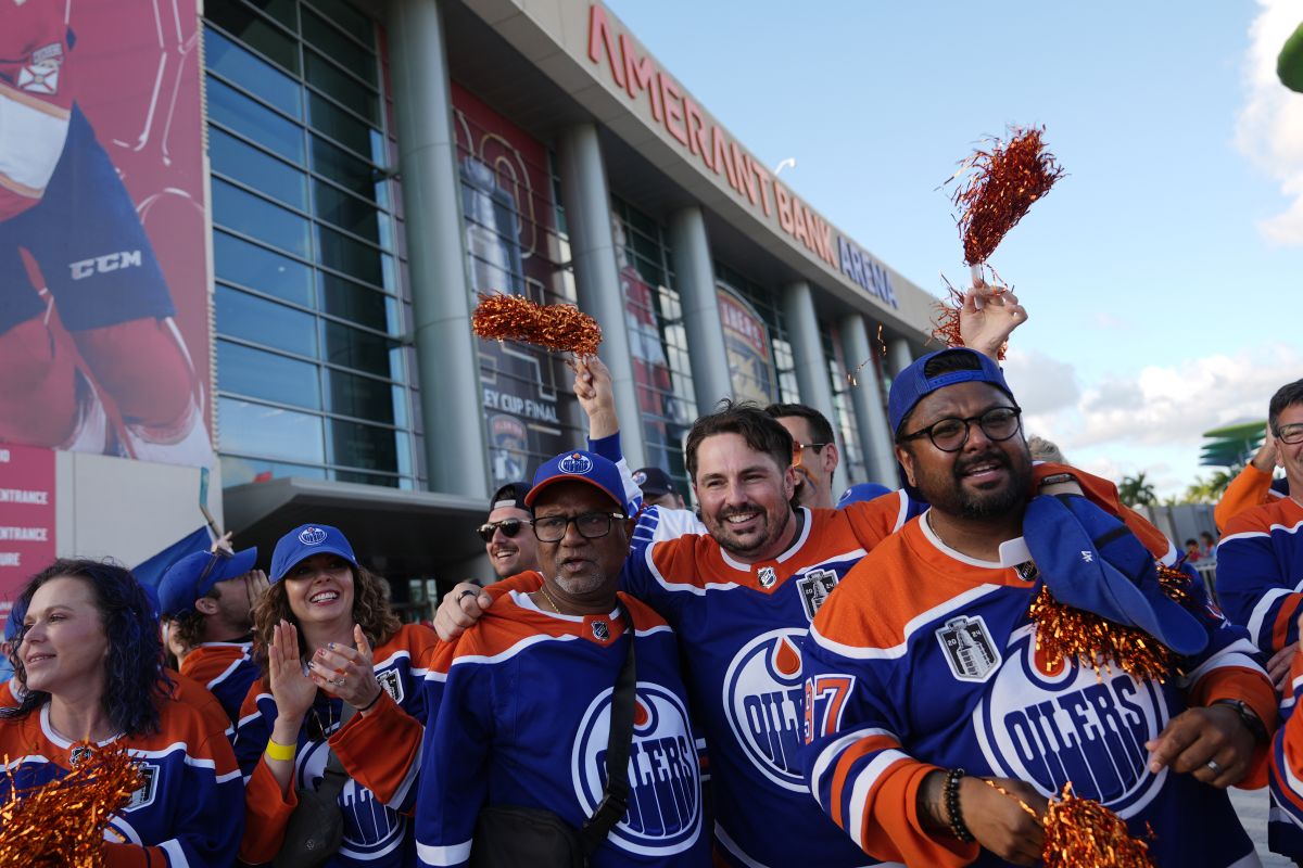 Edmonton Oilers fans wait to enter the arena before Game 5 of the NHL hockey Stanley Cup Finals between the Florida Panthers and the Edmonton Oilers, Tuesday, June 18, 2024, in Sunrise, Fla.