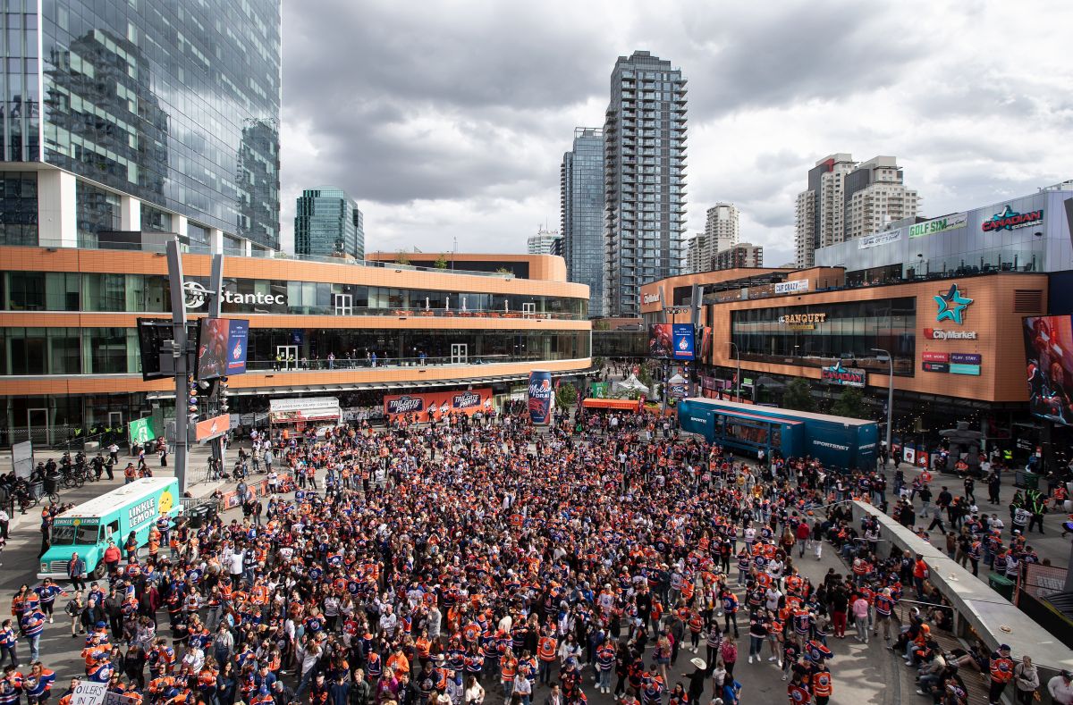 Hockey fans watch on a big screen as the Edmonton Oilers take on the Florida Panthers during a watch party for Game 5 of the NHL Stanley Cup final, in Edmonton on Tuesday, June 18, 2024.