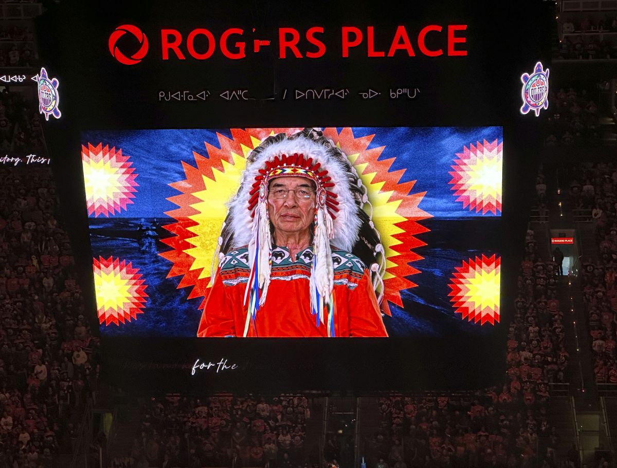 A First Nations land recognition video narrated by Chief Willie Littlechild plays on video screens prior to Game 3 of the Stanley Cup Final on Thursday, June 13, 2024, in Edmonton, Alberta. The Edmonton Oilers began airing the video prior to national anthems in 2021.