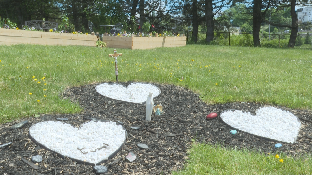 Three hearts represent the three people who perished in encampment fires this winter.