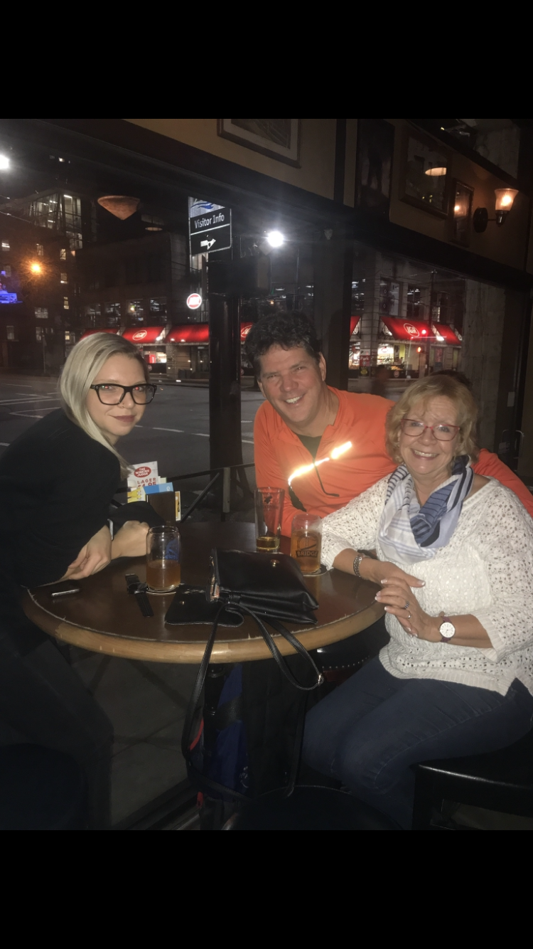 Sam with her parents Gaye and Jim.