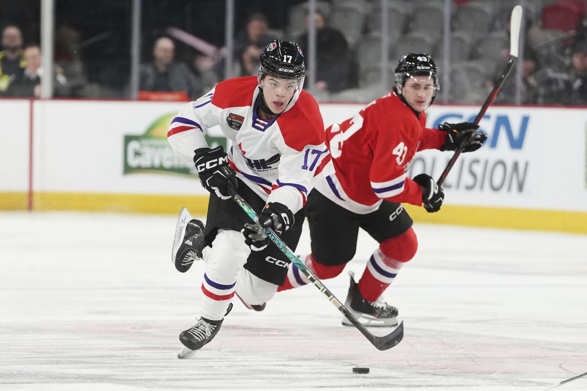FILE - Team White's Tij Iginla (17) carries the puck up ice in front of Team Red's Tanner Howe (43) during the first period of the CHL top prospects hockey game Wednesday, Jan. 24, 2024, in Moncton, New Brunswick.