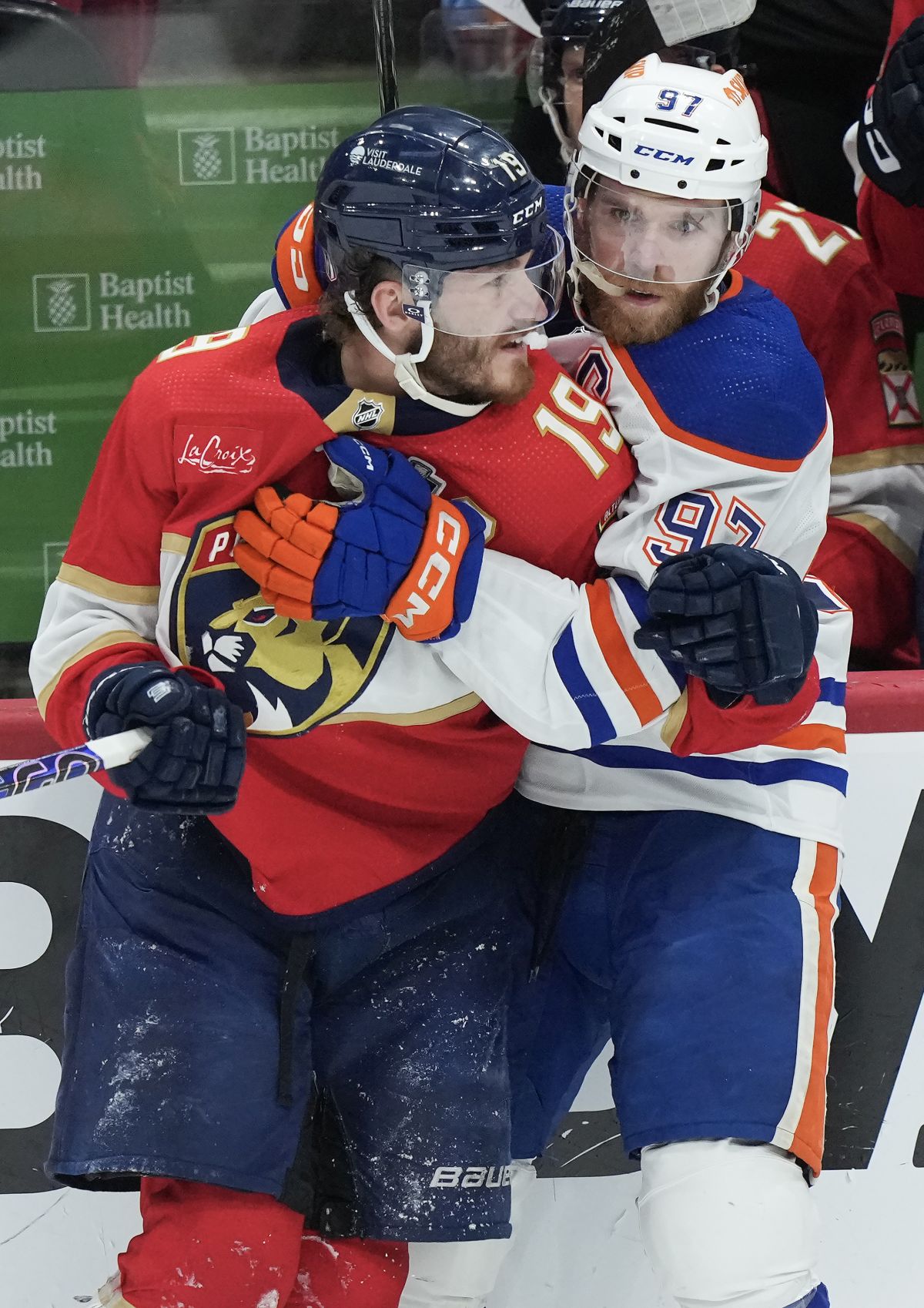 Edmonton Oilers forward Connor McDavid (97) ties up Florida Panthers forward Matthew Tkachuk (19) during second period game 2 action of the NHL Stanley Cup finals in Sunrise, Fla., on Monday, June 10, 2024.