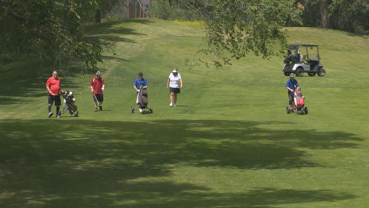 Golfers at the Spallumcheen Golf and Country Club.