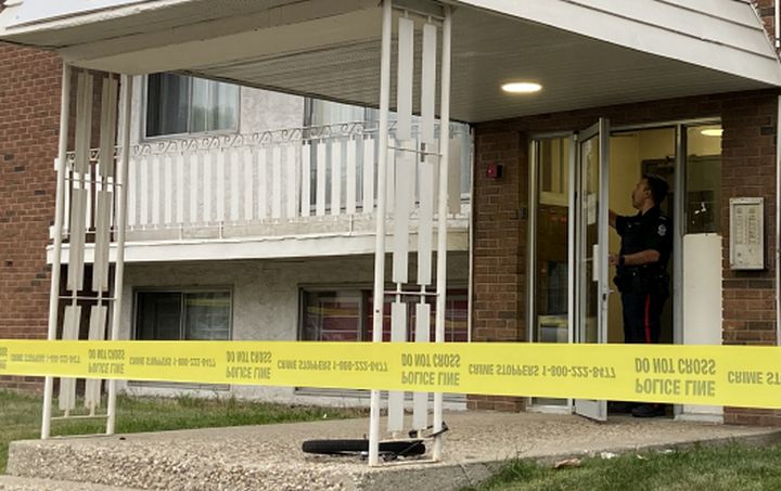 Police tape was seen blocking off the front entrance to a building on 82nd Avenue near 95th Street in Edmonton on June 26, 2024.