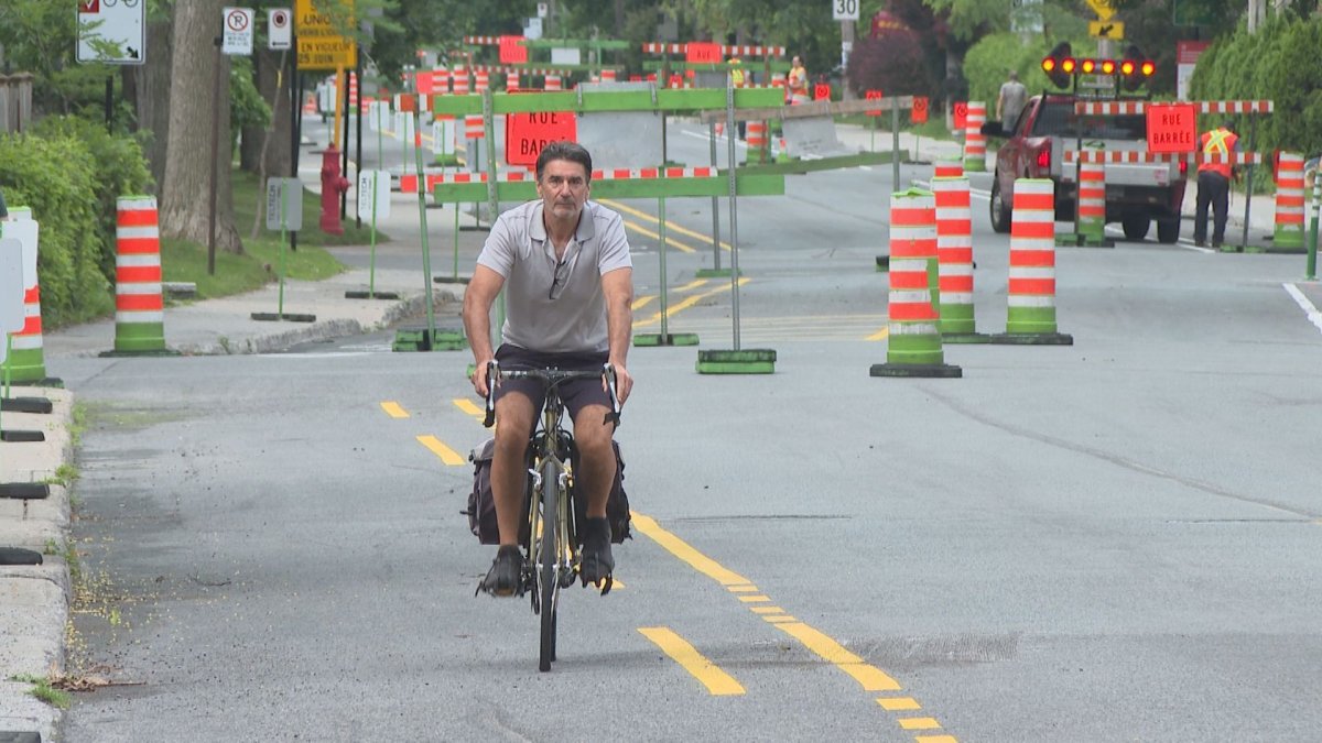 Cyclist rides down new Terrebonne bike path in NDG.