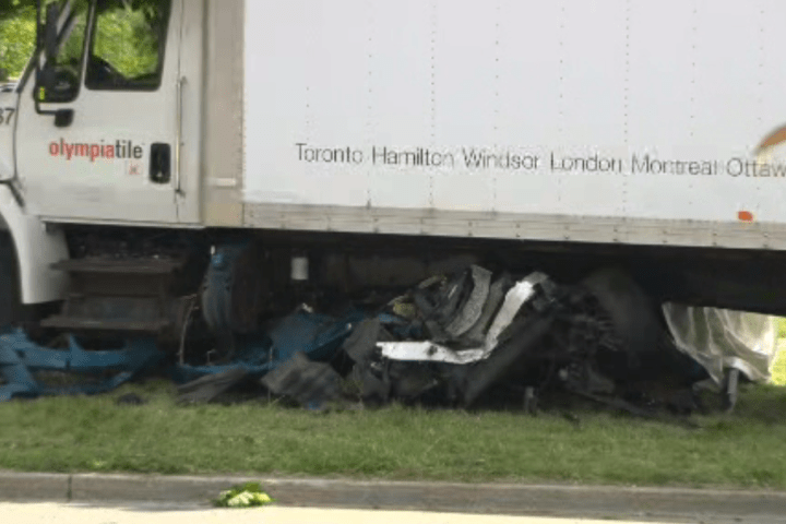 Woman dead after car crushed by truck in Markham, driver faces impaired charge