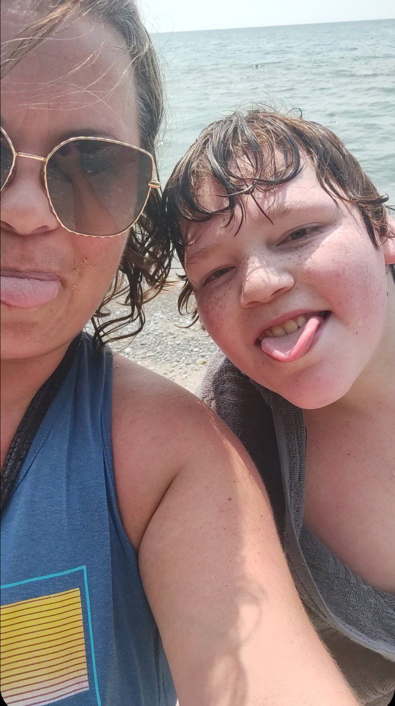 The mother of a 16-year-old with special needs who died at his eastern Ontario high school last month says she is broken because her boy is gone, and she wants everyone to hold their own children tight. Landyn Ferris, right, is seen in an undated family handout photo with his mother Brenda Davis.