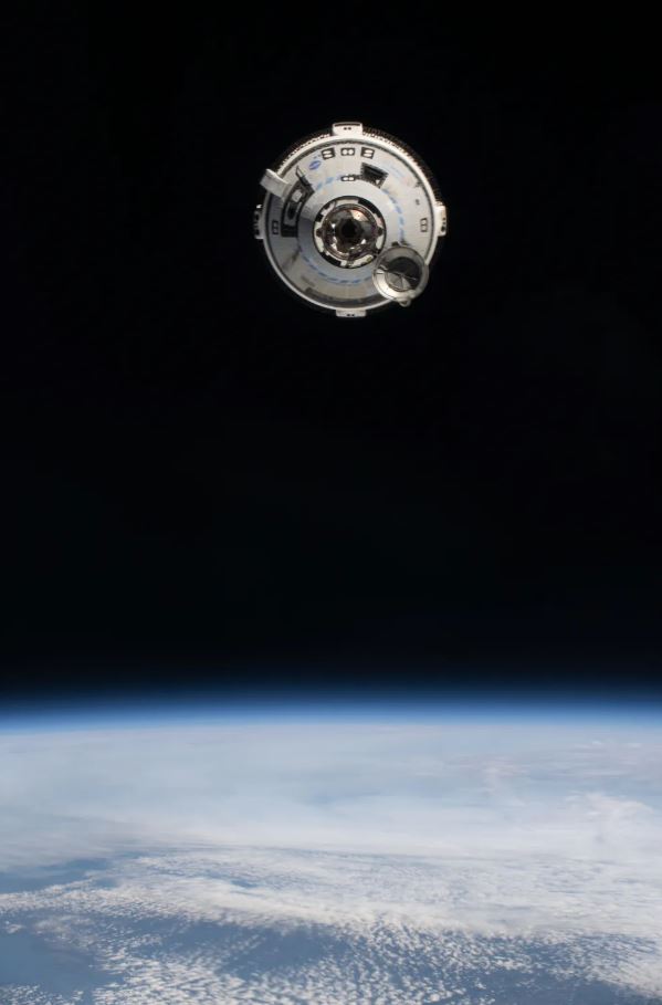 The Starliner spacecraft on NASA’s Boeing Crew Flight Test approaches the International Space Station while orbiting 263 miles above Quebec.