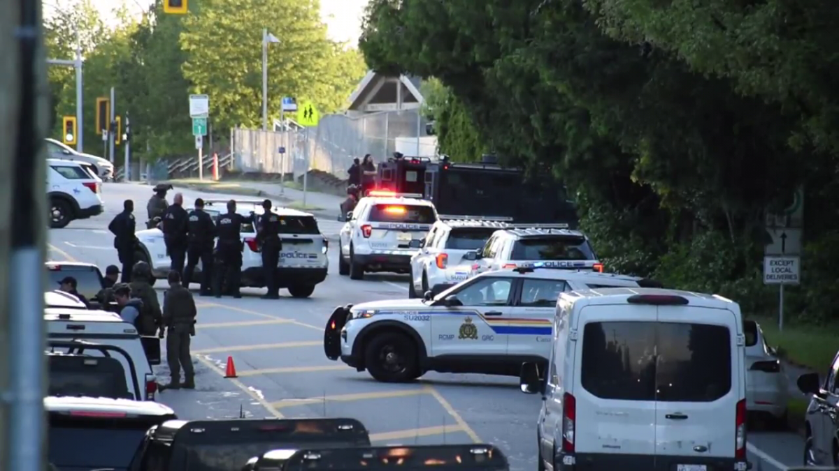 Surrey RCMP at the scene of a standoff on Thursday evening.